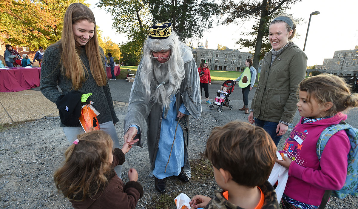 President Garvey greets trick-or-treaters